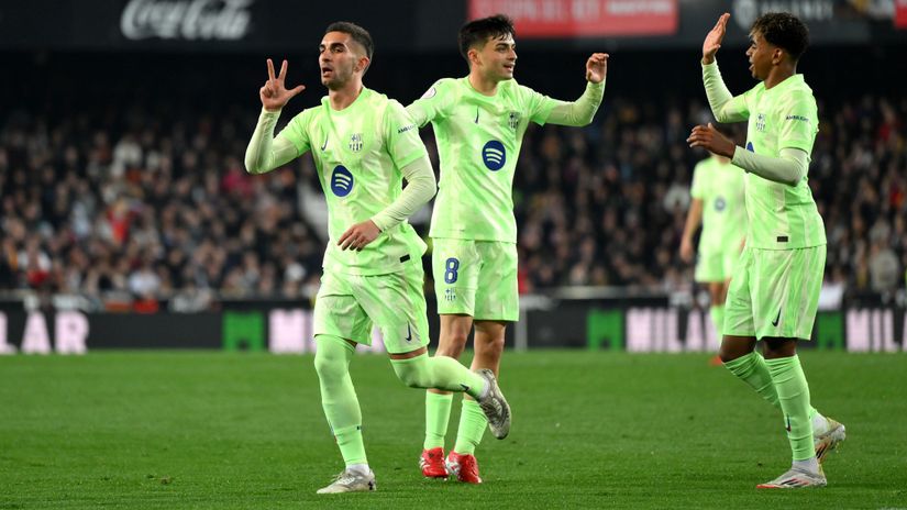 Ferran Torres celebrates after scoring a hat-trick (©David Ramos/Getty Images)