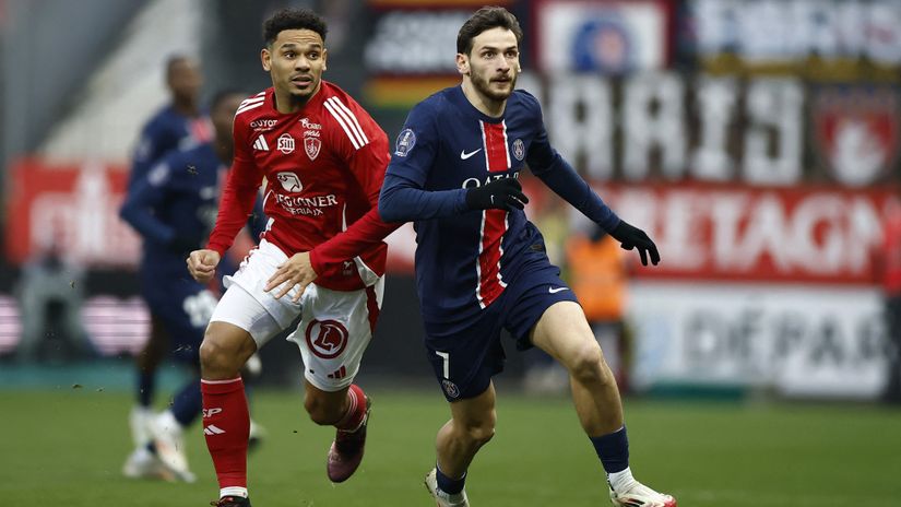 Paris St Germain's Khvicha Kvaratskhelia in action with Brest's Kenny Lala 10 days ago (Gallo Images)