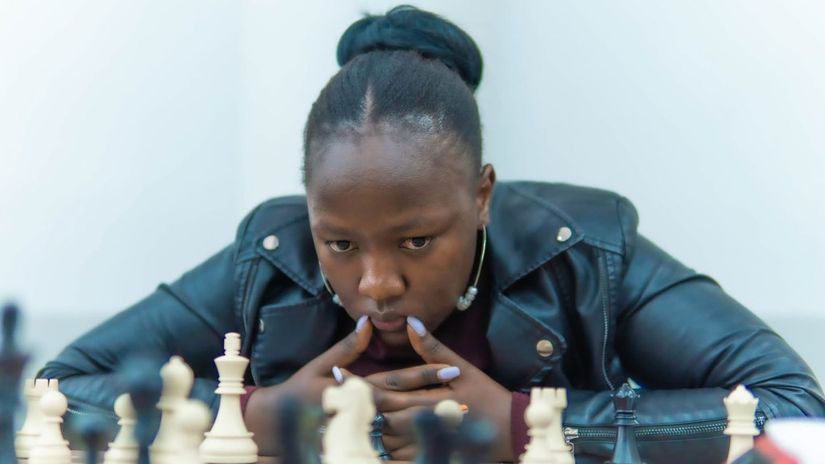 Caption/ Joyce Nyaruai on her way to winning the Zone 4.4 chess championship / Chess Kenya