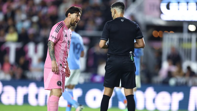Messi and a ref during an MLS game (©Megan Briggs/Getty Images)