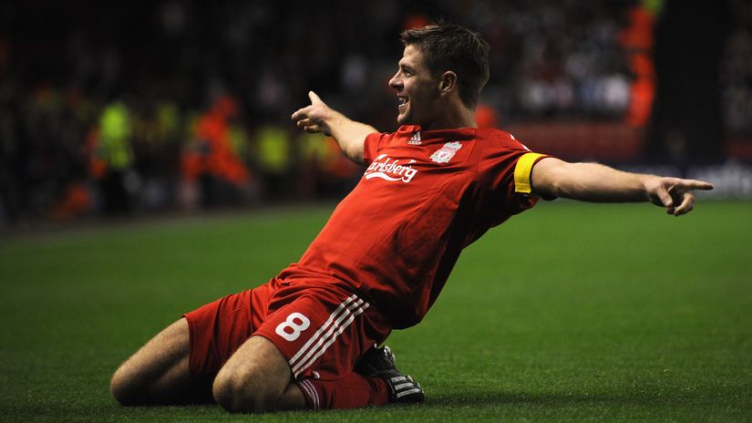 Steven Gerrard celebrates a goal during his spell with Liverpool (©Shaun Botterill/Getty Images)