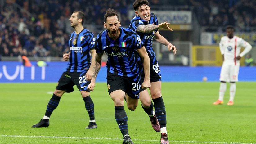 Calhanoglou celebrates after slotting it in against Monza (©REUTERS/Claudia Greco)