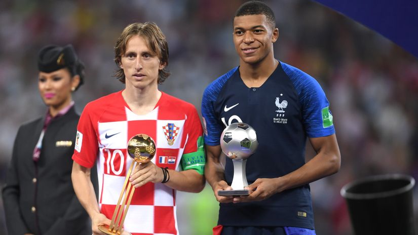 Modric and Mbappe after the 2018 FIFA WC showdown (©Laurence Griffiths/Getty Images)
