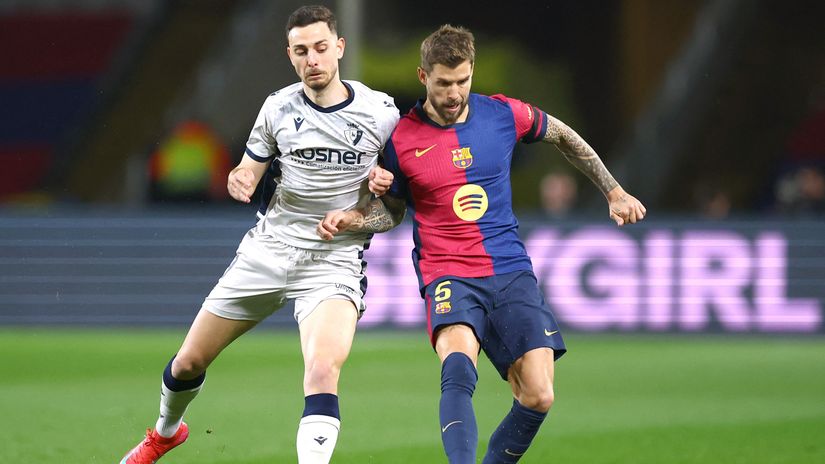 Inigo Martinez in action with Raul Garcia (©Getty Images)