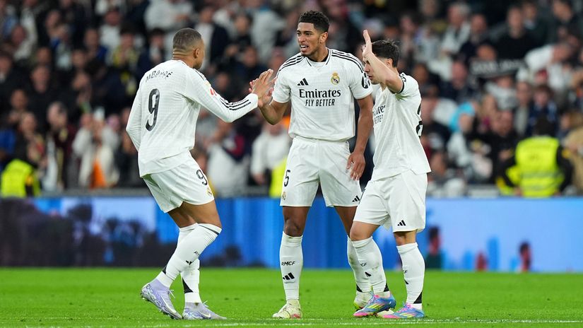 Real Madrid players celebrating (©Getty Images)