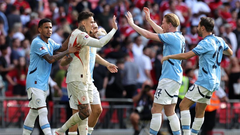Ederson with teammates (©David Rogers/Getty Images)