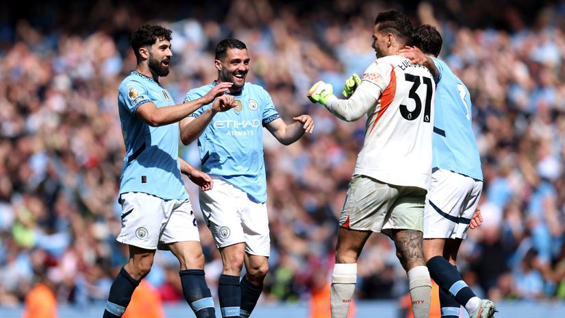 Ederson celebrates his latest assist with Gvardiol, Kovacic, and Dias (©Matt McNulty/Getty Images)