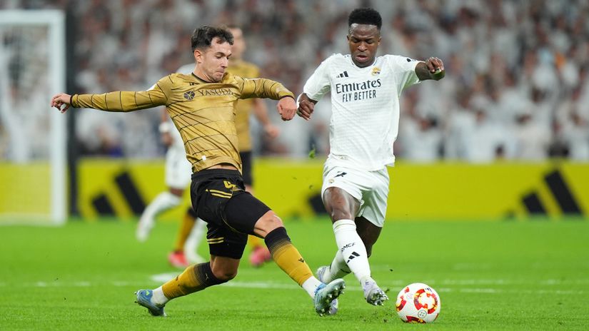 Zubimendi in action against Vini Jr (©Angel Martinez/Getty Images)