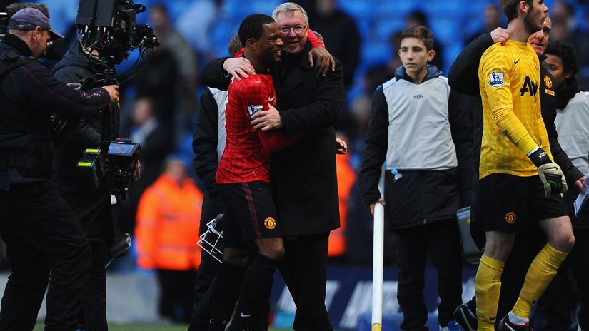 Patrice Evra and Alex Ferguson (©Laurence Griffiths/Getty Images)