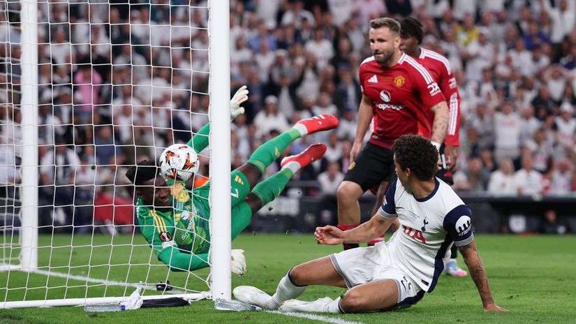 Onana concedes after the ball deflects off Shaw (©Michael Steele/Getty Images)
