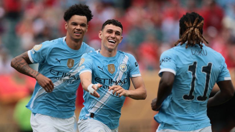 O'Reilly and the two scorers, Foden and Doku, celebrate Man City's opening goal (©IMAGN IMAGES via Reuters/Caean Couto)