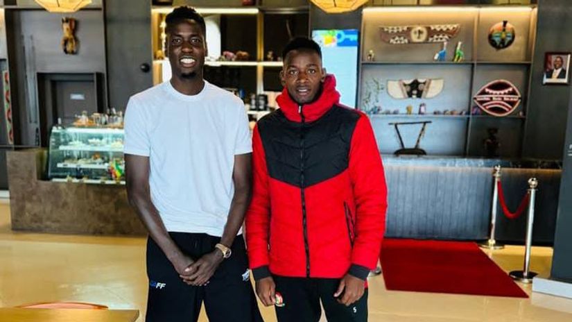 Okumu posses with Alphonce Omija ©Courtesy