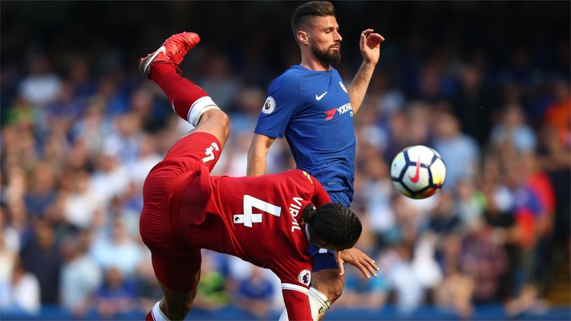 Giroud against Van Dijk in action back in 2018 (©Julian Finney/Getty Images) 