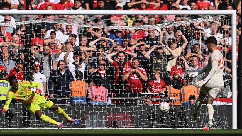 Ederson scores from the spot past Onana in the 2024 Community Shield (©Stu Forster/Getty Images)