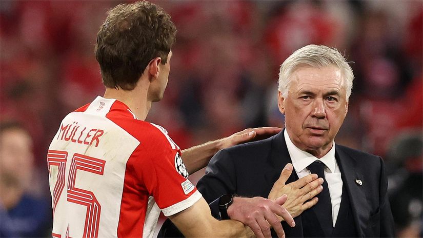 Thomas Muller and Carlo Ancelotti (©Alexander Hassenstein/Getty Images)