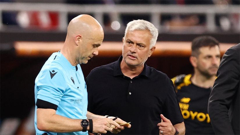 Mourinho confronts Taylor during the 2023 UEL final (©Naomi Baker/Getty Images)
