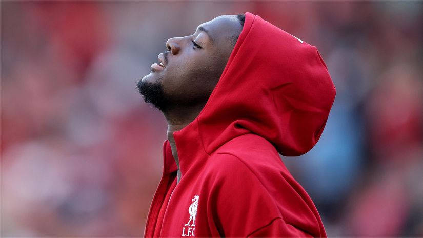 Ibrahima Konate wearing a Liverpool hoodie (©Carl Recine/Getty Images)