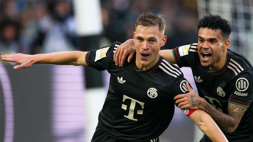 Kimmich celebrates with Luis Diaz after scoring (©Dean Mouhtaropoulos/Getty Images)