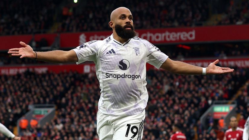 Mbeumo celebrates his opener against Liverpool (©Michael Regan/Getty Images)