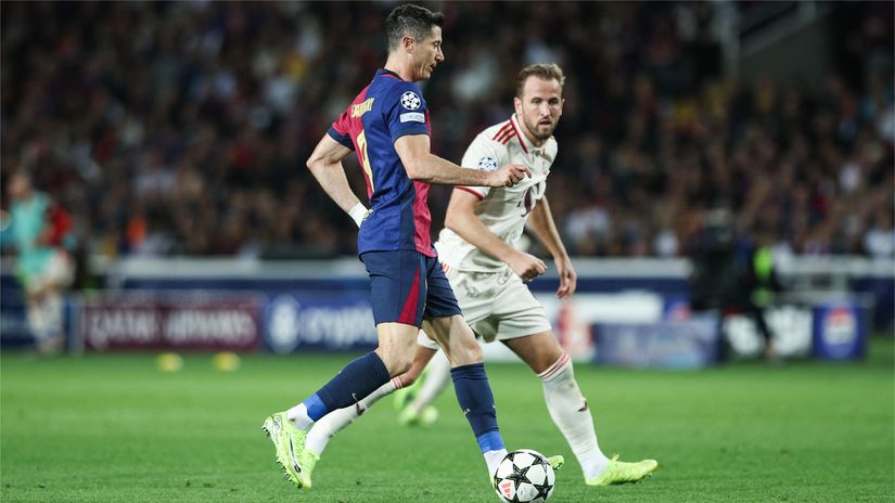 Lewandowski and Kane in the Champions League clash (©AFP)