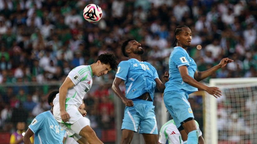 Somali players (in blue) in action against Algeria last month (©AFP)