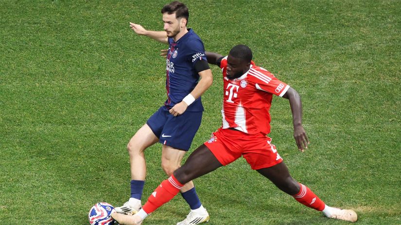 Upamecano with a tackle on Khivcha (©Megan Briggs/Getty Images)