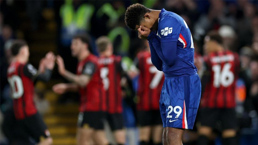 Reece James in despair, with Bournemouth players celebrating in the back (©Eddie Keogh/Getty Images)