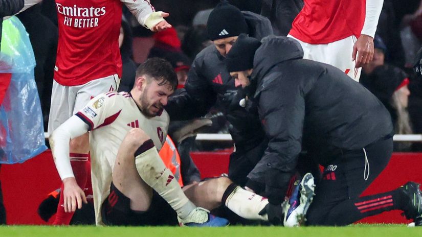 Bradley receiving help from Liverpool's medical team after picking up the severe injury (©Marc Atkins/Getty Images/Gallo Images)