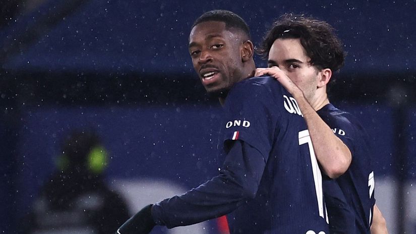 Dembele celebrating his brace with Vitinha (©AFP)