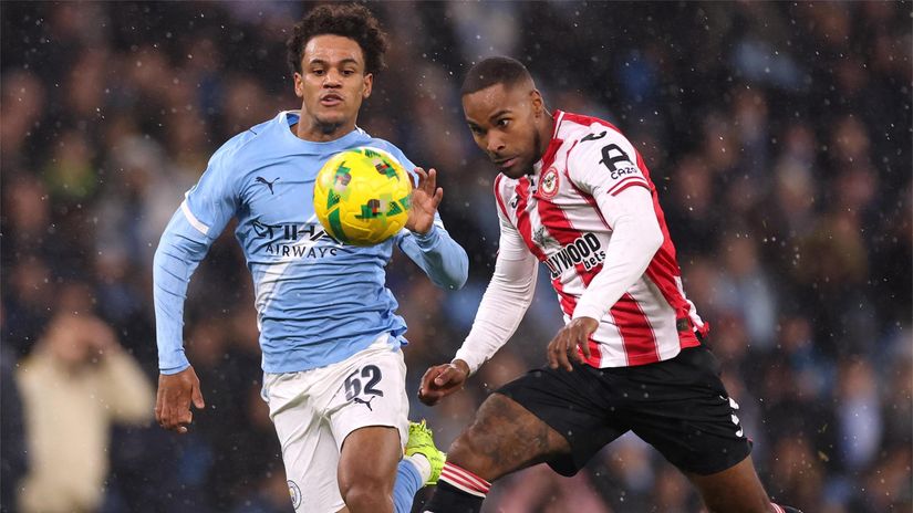 Bobb (left) in action for City against Brentford in December (©Carl Recine/Getty Images)