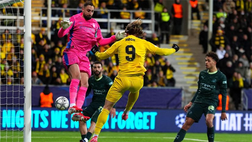 Kasper Hogh scores past Donnarumma recently (©Martin Ole Wold/Getty Images)