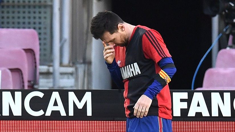 Messi celebrating a goal for Barcelona in Newell's Old Boys' jersey to pay tribute to late Diego Maradona, in November 2020 (©David Ramos/Getty Images)