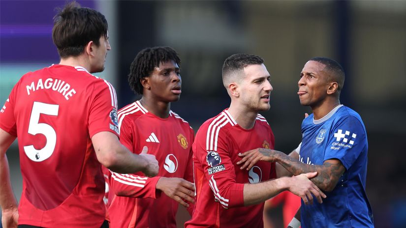 Young confronts Maguire during the Man Utd vs. Everton tie in February 2025 (©Jan Kruger/Getty Images)