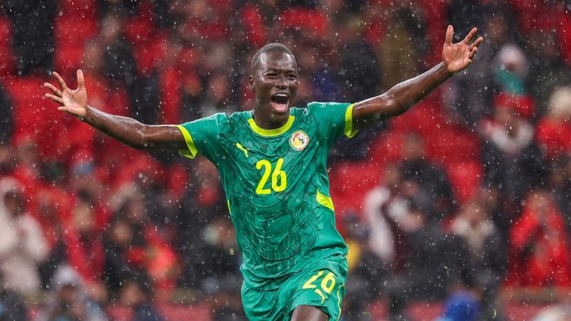 Gueye celebrating his winner in the 2025 AFCON final (©AFP)