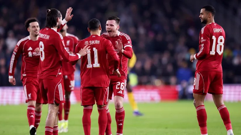 Liverpool players celebrating the goal (©Getty Images)