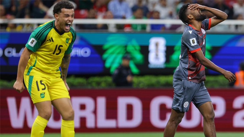 Pierre Iekawe of New Caledonia (right) reacts after the final whistle against Jamaica(©Agustin Cuevas/Getty Images)