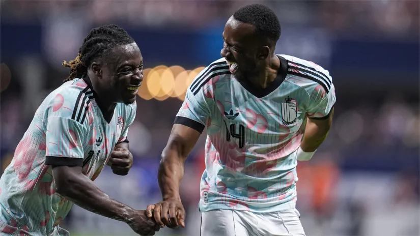 Doku and Lukebakio celebrate last night (©Dale Zanine-Imagn Images)