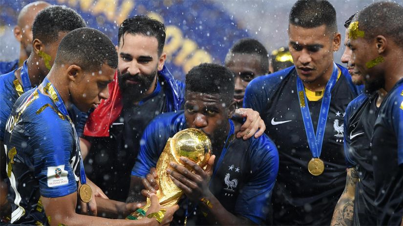 Umtiti and Mbappe after winning the 2018 FIFA World Cup (©Matthias Hangst/Getty Images)
