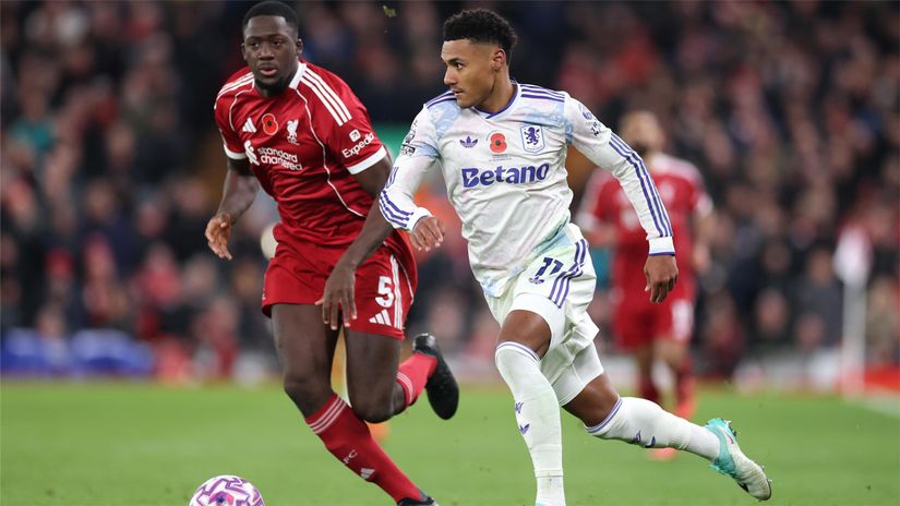 Konate of Liverpool and Watkins of Aston Villa in action (©Jan Kruger/Getty Images)