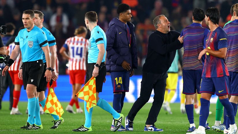 Flick pushing his players away from the referees after the match against Atletico (©Reuters/Albert Gea/Gallo Images)
