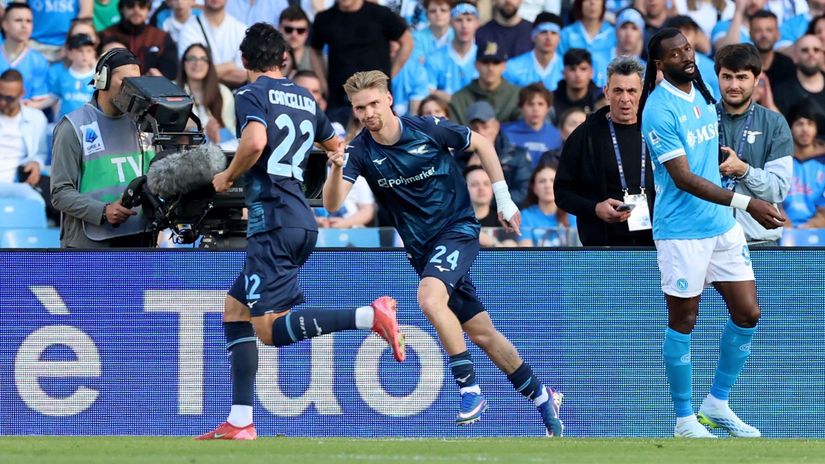 Matteo Cancellieri celebrates his opener with Kenneth Taylor in front of the stunned Napoli fans (©Reuters/Ciro De Luca/Gallo Images)