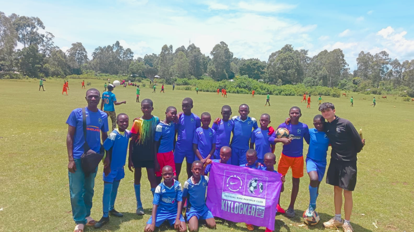 Jacob Dockree with players from AFC Stoneham Kenya 