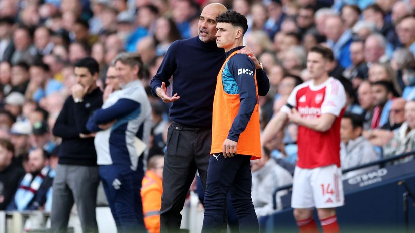 Pep giving instructions to Foden in the dying minutes of the recent derby (©Michael Regan/Getty Images)
