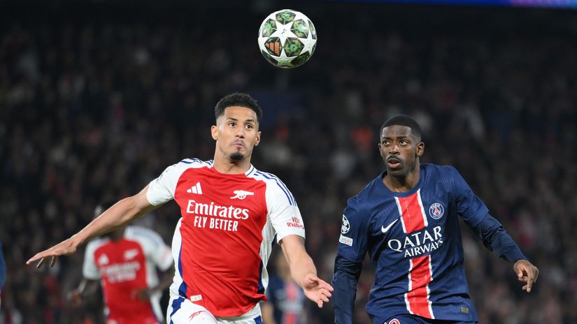 William Saliba of Arsenal and Ousmane Dembele of PSG battle for the ball in the UCL semi-final last season (©David Ramos/Getty Images)