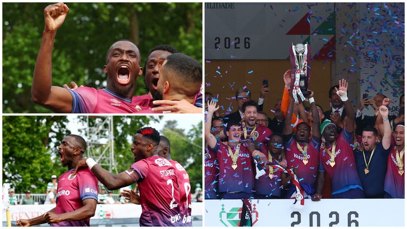 Torreense's Stopira lifts the trophy as the players celebrate winning the Taca de Portugal (©REUTERS/Pedro Nunes)
