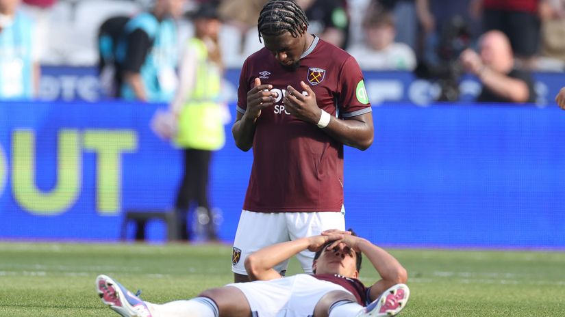 Axel Disasi and Mateus Fernandes in disbelief after WHU were relegated (©Richard Pelham/Getty Images)