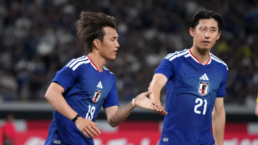 Japan players celebrating the goal (©Getty Images)