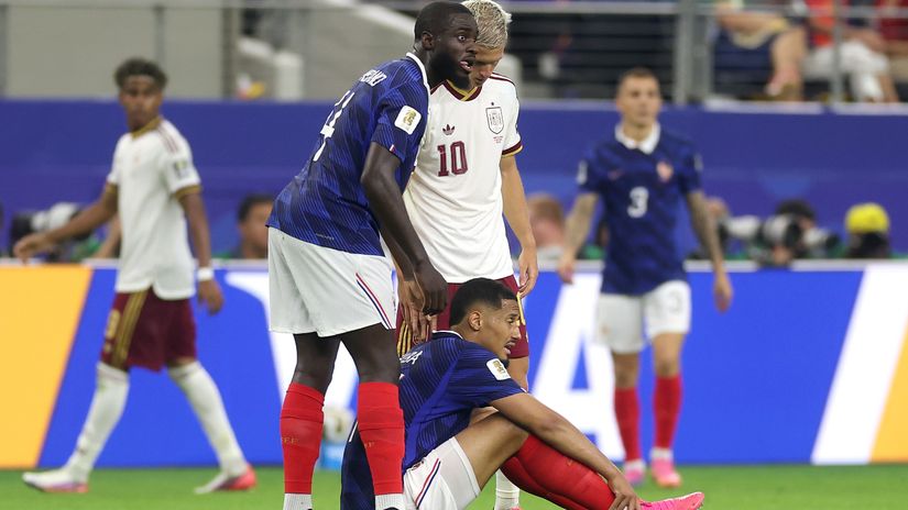 Saliba after picking up the back injury against Spain (©Lars Baron/Getty Images)
