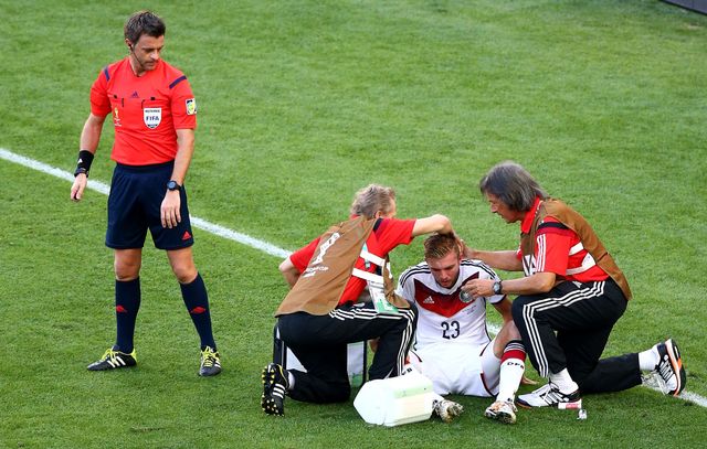 Kramer receives medical treatment following his collision with Garay (©Robert Cianflone/Getty Images)