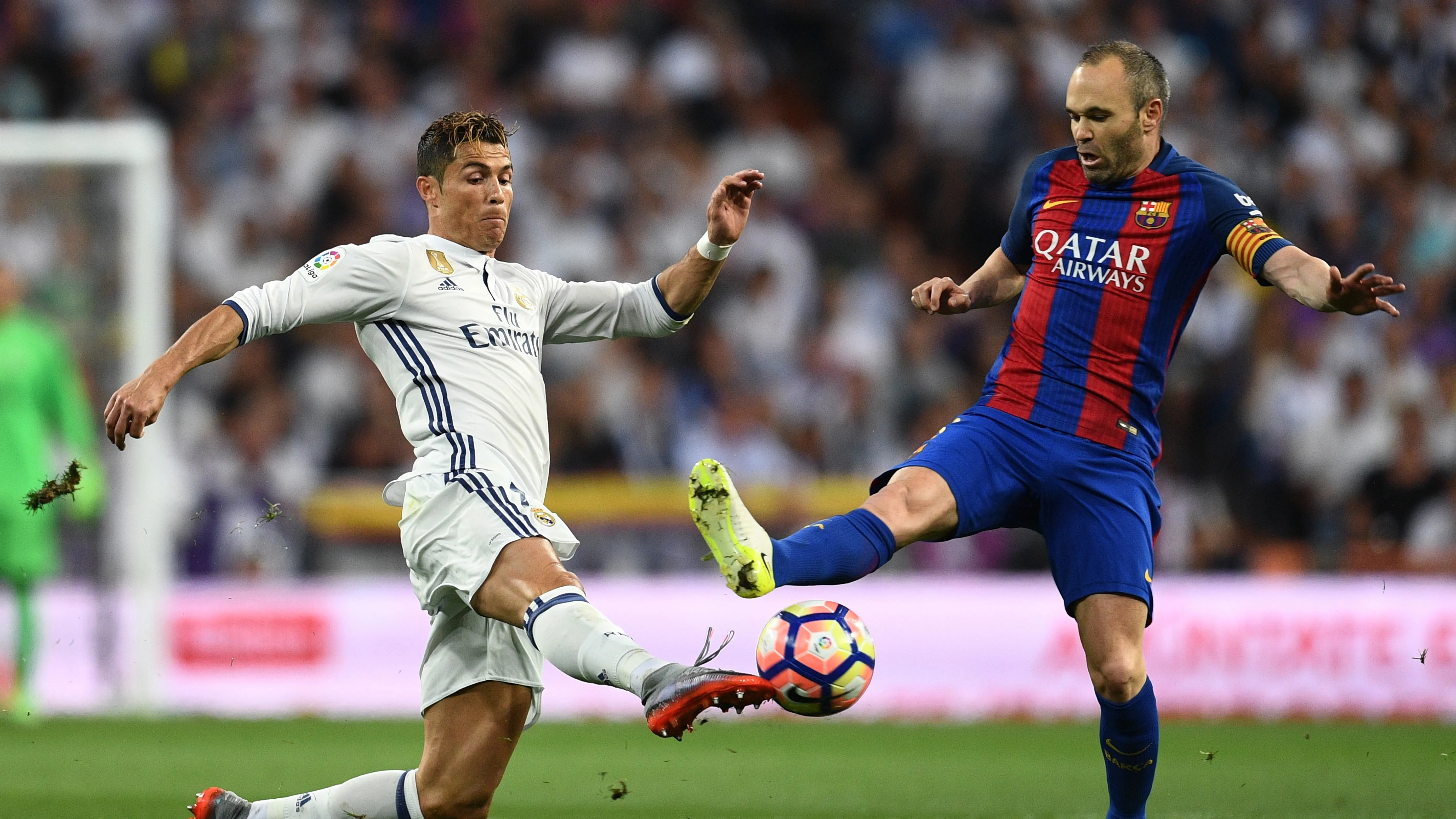Iniesta in action with Ronaldo during his time in Barcelona (©Getty Images)